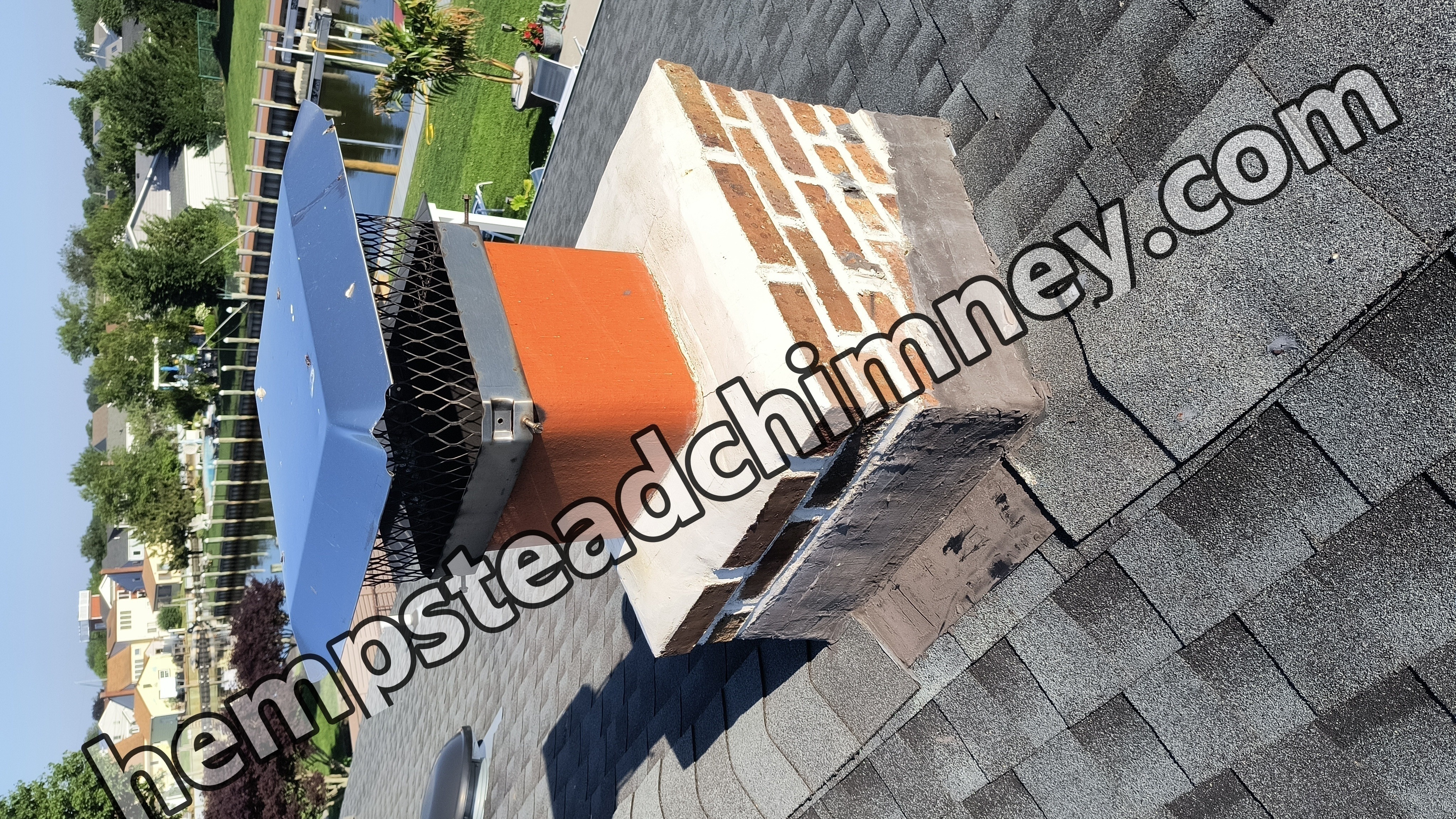 Full chimney masonry rebuild and restoration in Hempstead, NY