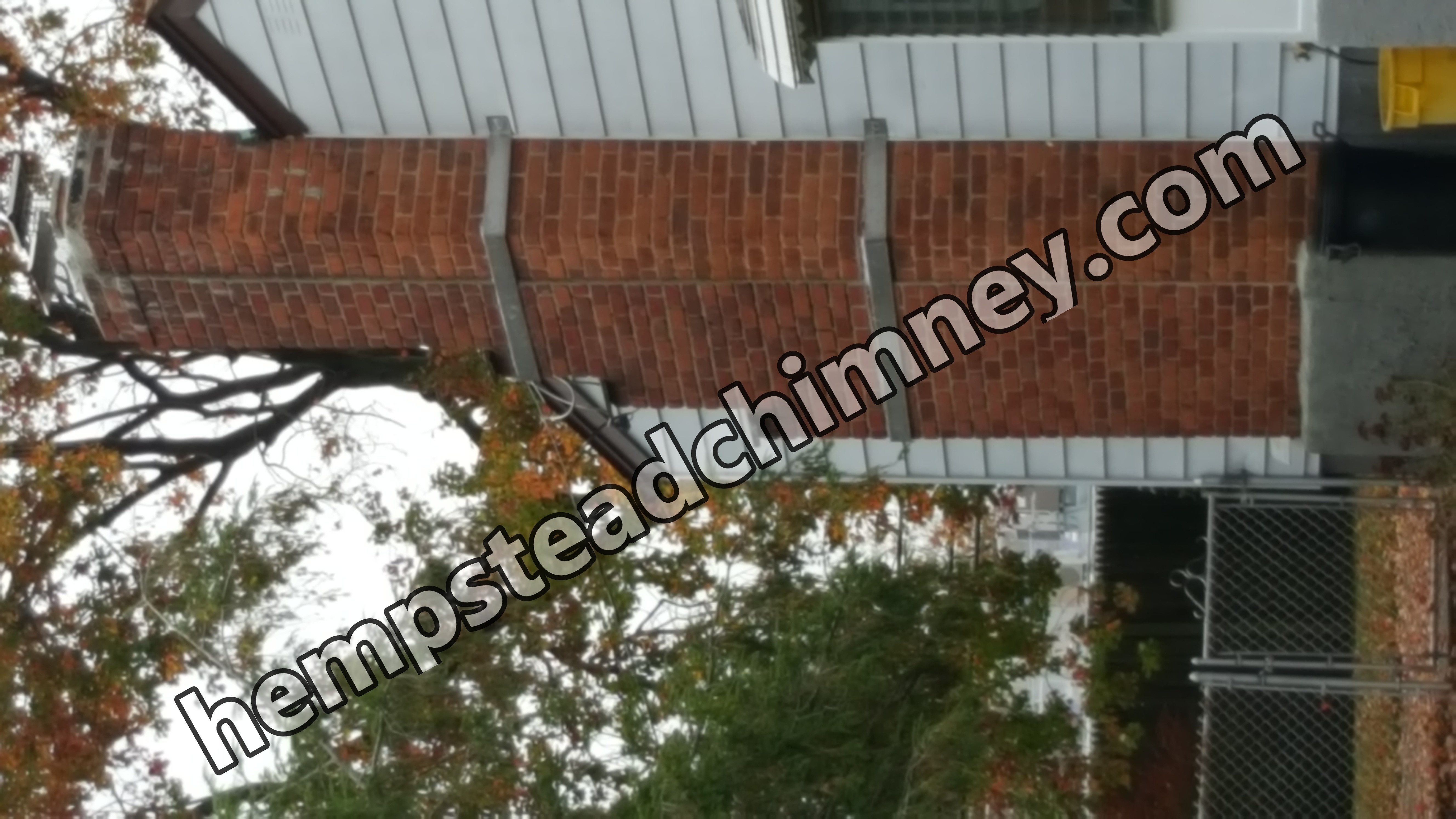 Heavy oil soot removal from chimney flue in Hempstead, New York